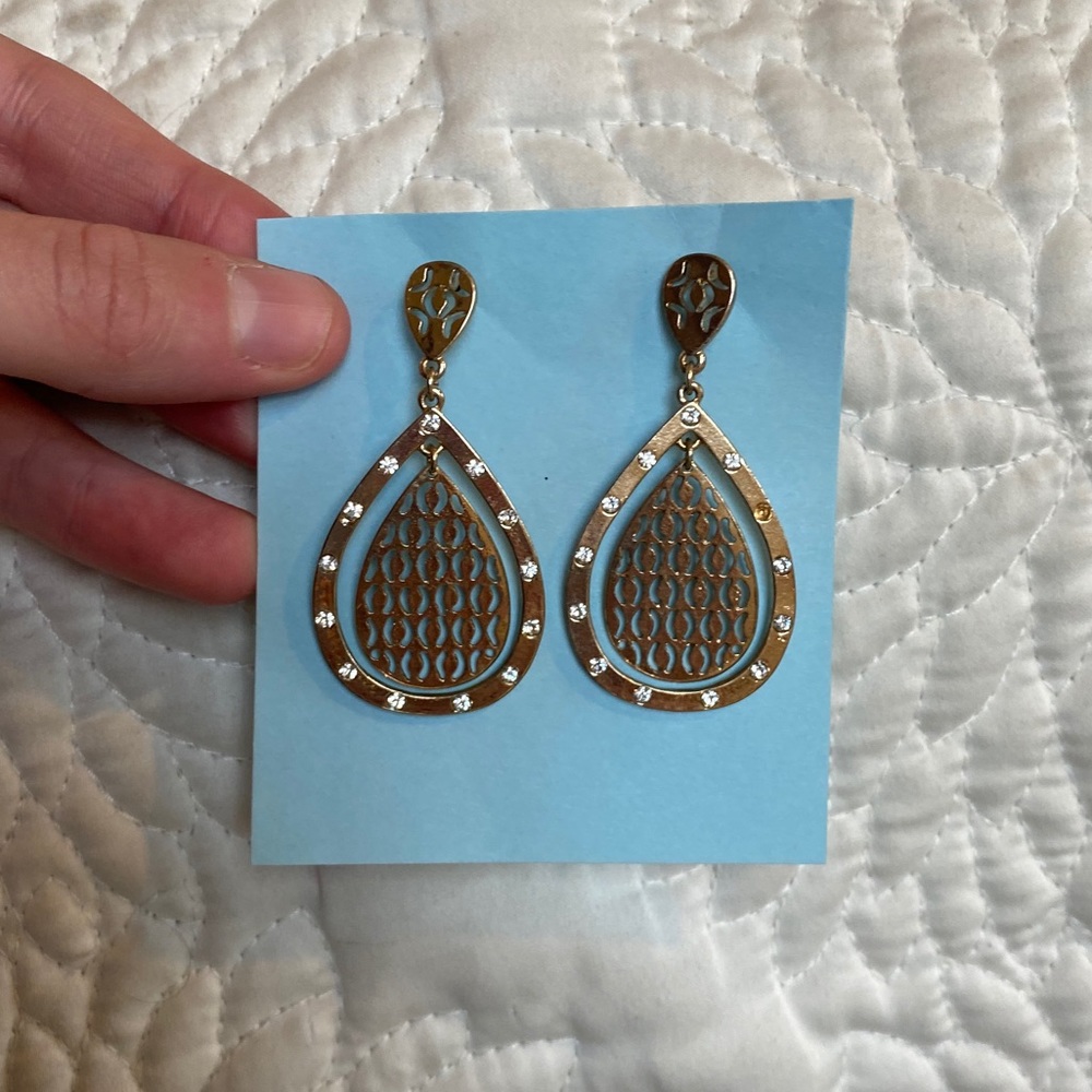 Never worn gold earrings